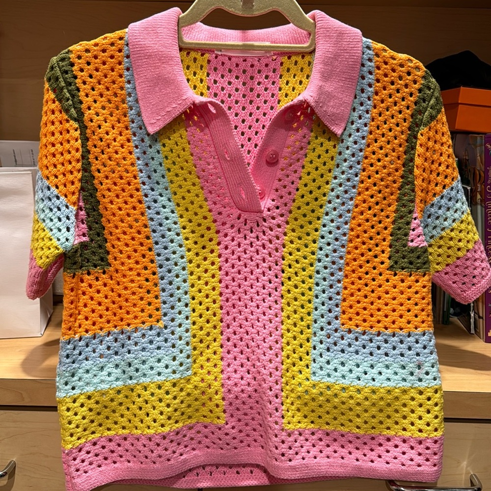 Crochet collard polo shirt. Pink buttons multi color knit